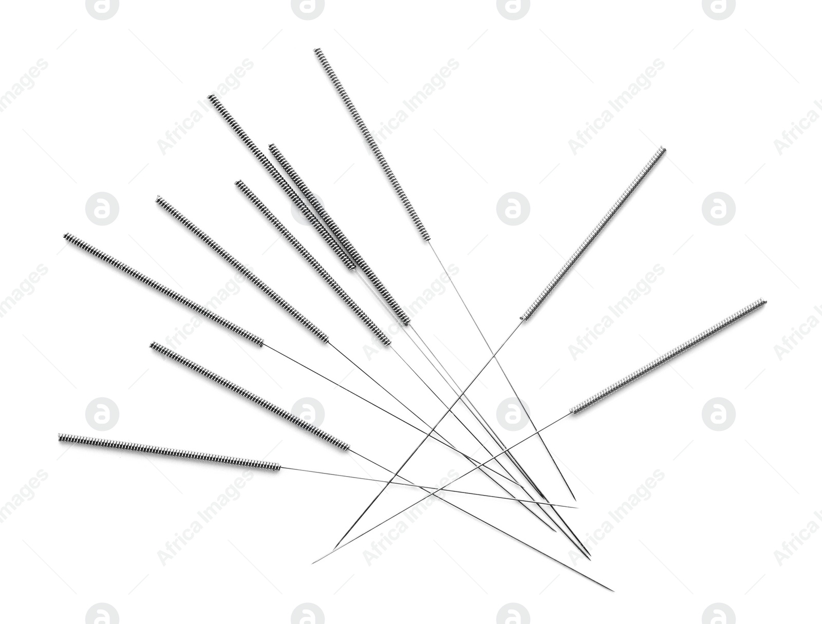 Photo of Needles for acupuncture on white background