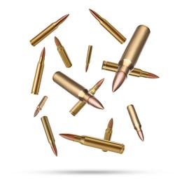 Many bullets falling on white background. Firearm ammunition