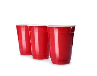 Red plastic cups on white background. Beer pong game