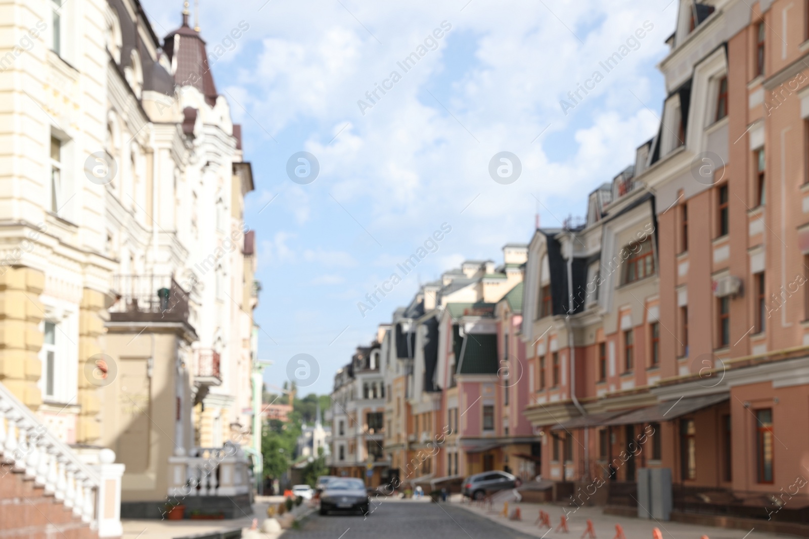 Photo of Blurred view of buildings with beautiful windows in city