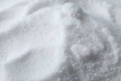 Photo of Organic white sea salt as background, closeup