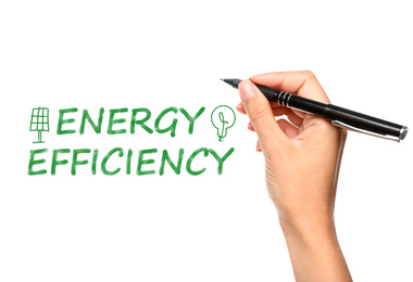 Energy efficiency concept. Woman writing on white background, closeup