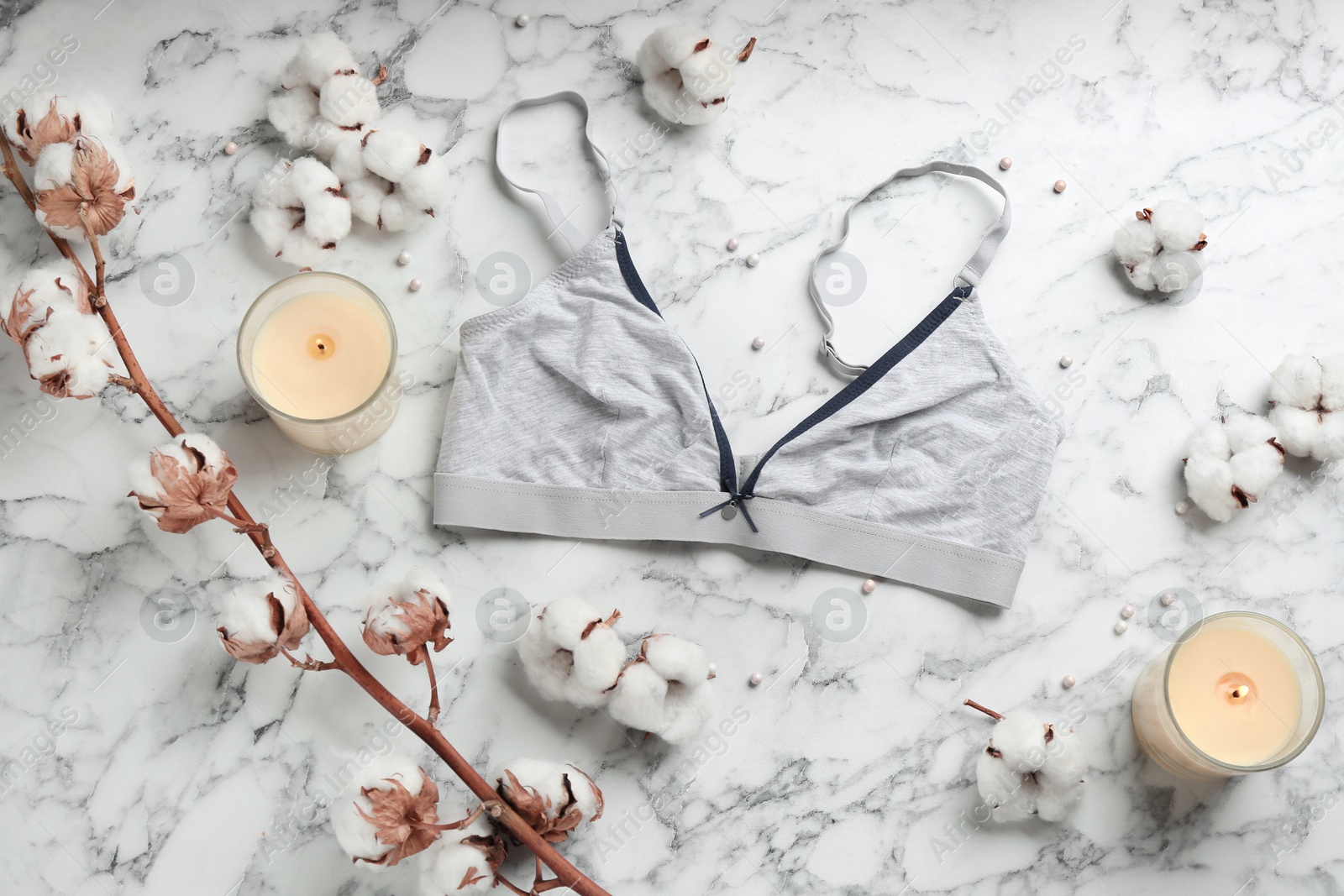 Photo of Flat lay composition with women's underwear on marble background