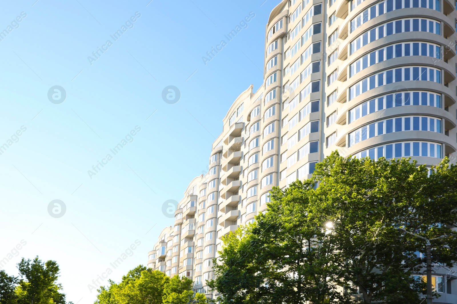 Photo of Beautiful view of modern building outdoors on sunny day