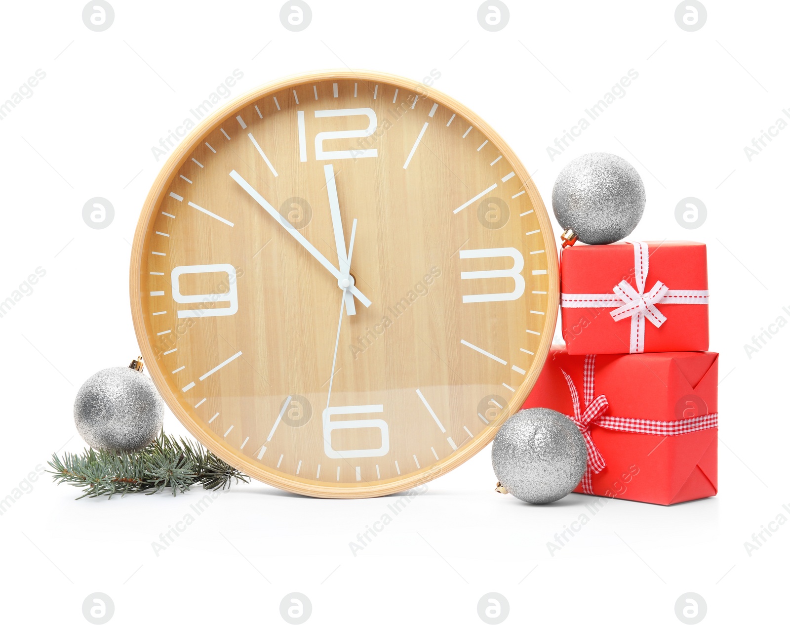 Photo of Clock, gifts and festive decor on white background. Christmas countdown