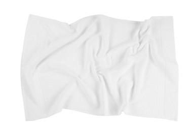 Photo of Crumpled beach towel on white background, top view