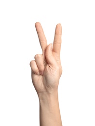 Woman showing K letter on white background, closeup. Sign language