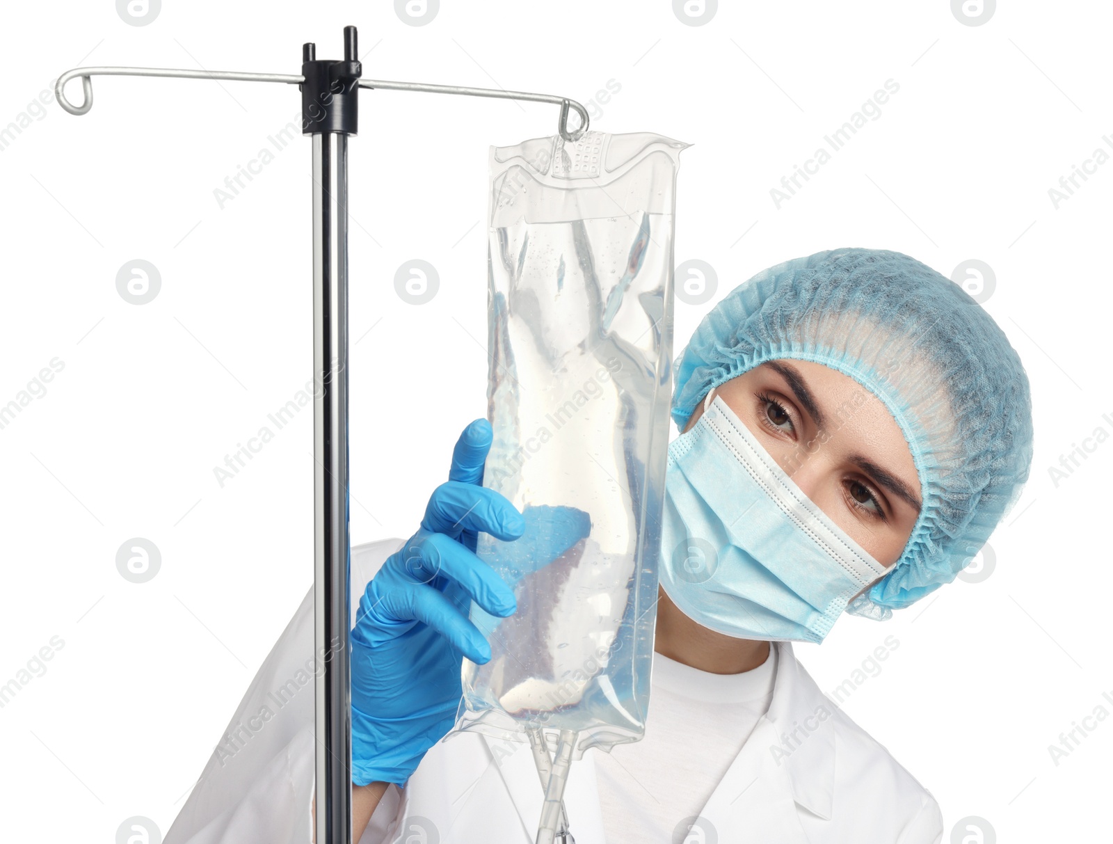 Photo of Nurse setting up IV drip on white background