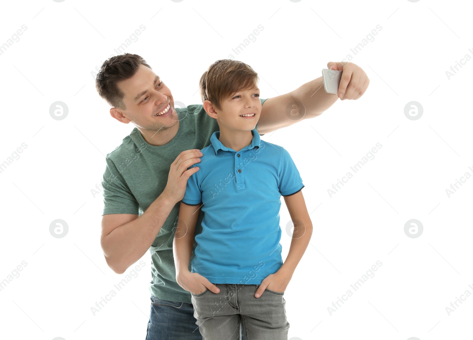 Photo of Dad and his son taking selfie on white background