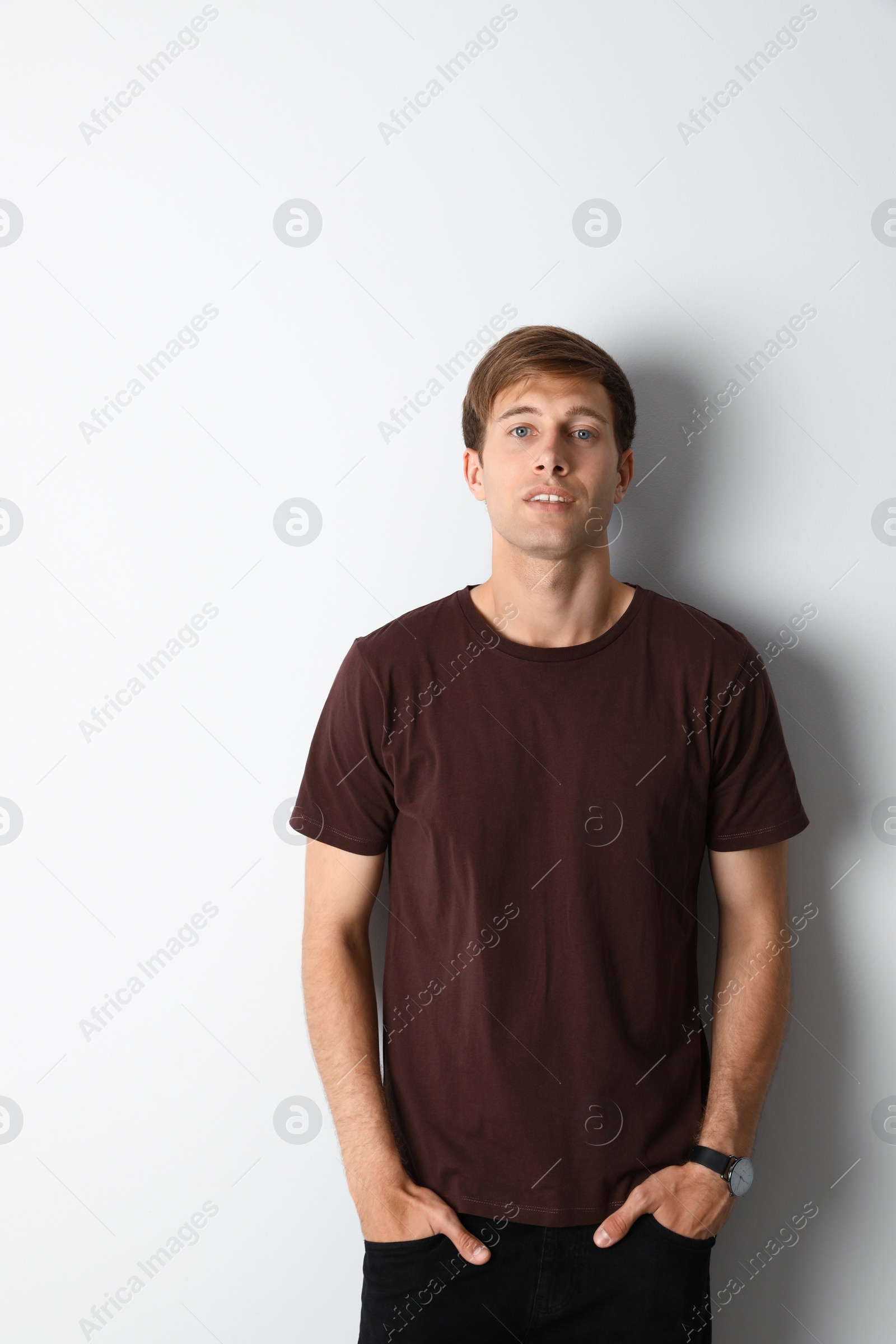 Photo of Portrait of handsome man on light background