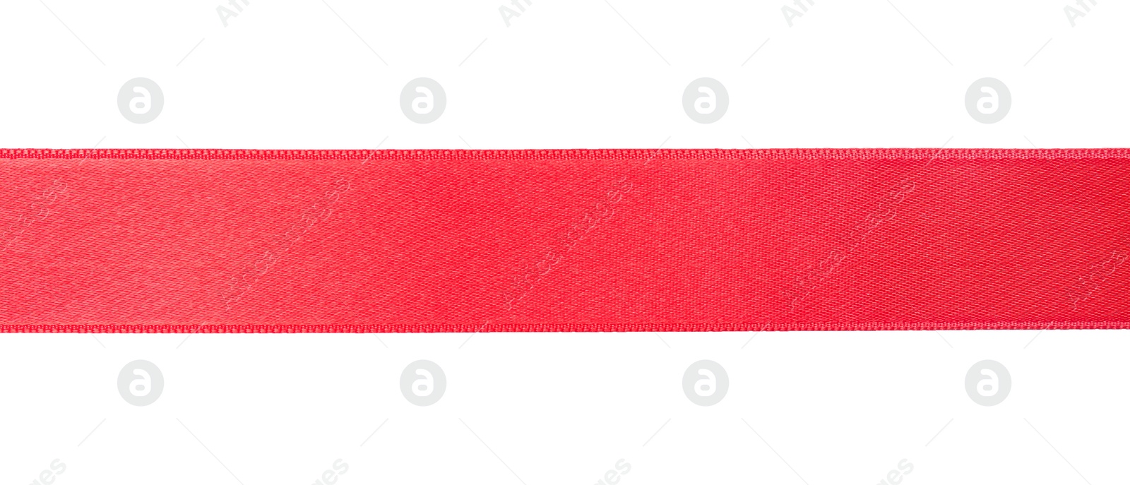 Photo of Simple red ribbon on white background, top view