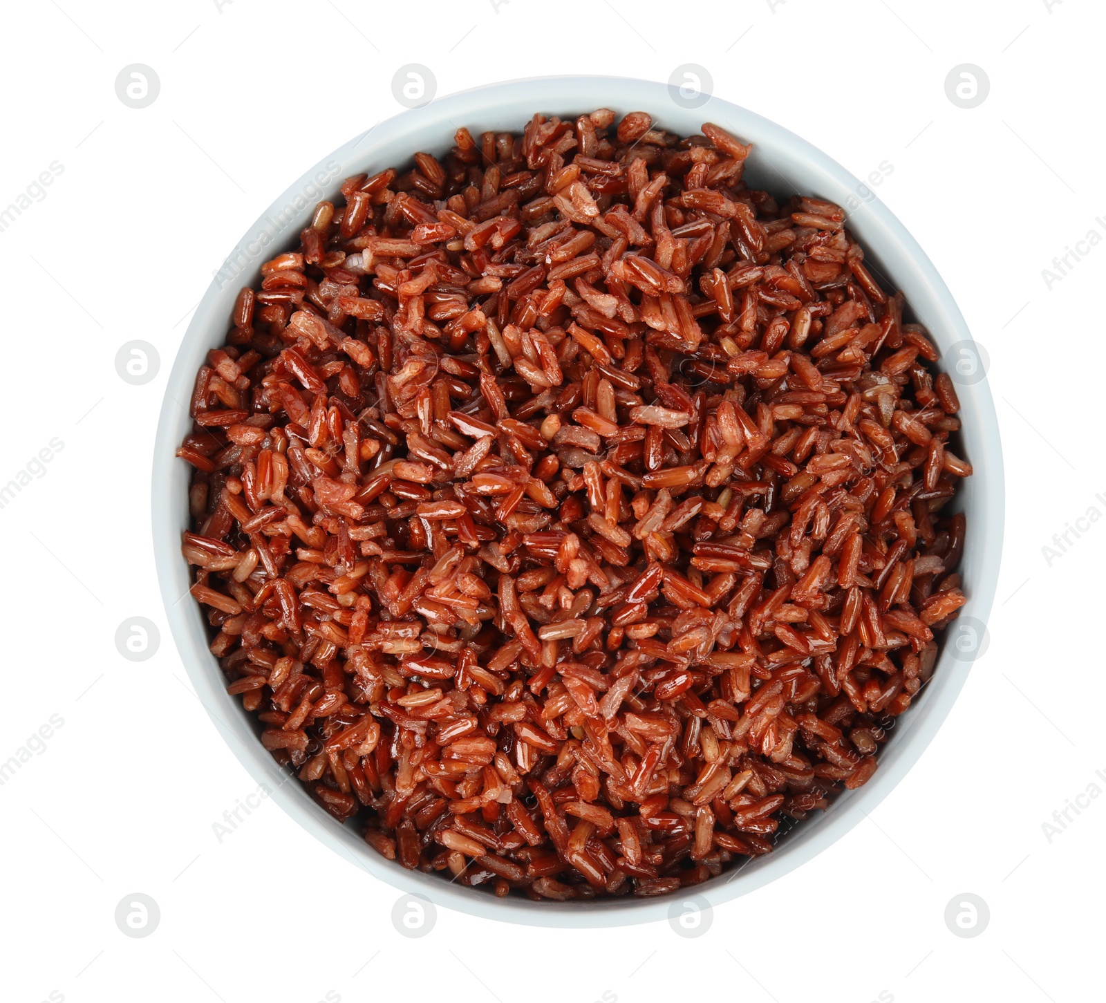 Photo of Bowl with delicious cooked brown rice on white background, top view