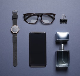 Flat lay composition with male accessories on blue background