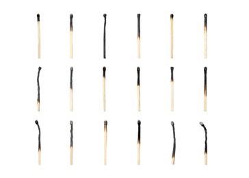 Image of Set with burnt matches on white background