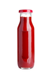 Photo of Glass bottle of tasty ketchup isolated on white