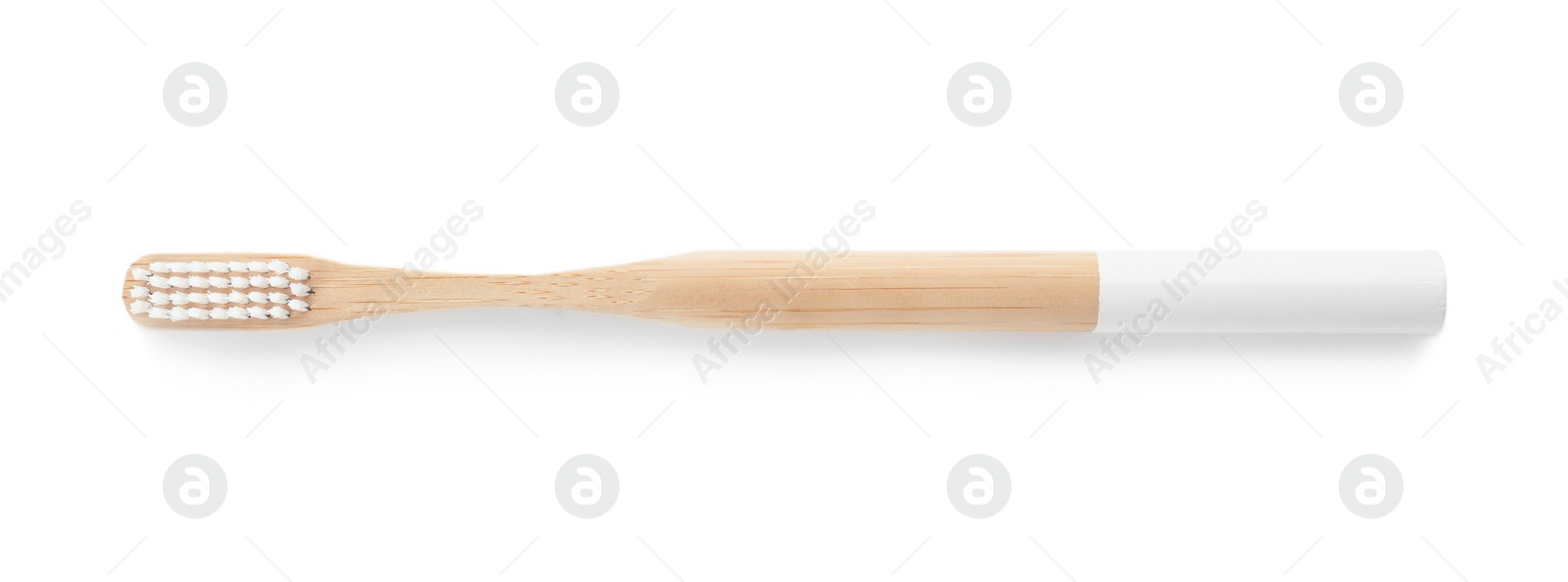 Photo of Toothbrush made of bamboo on white background, top view