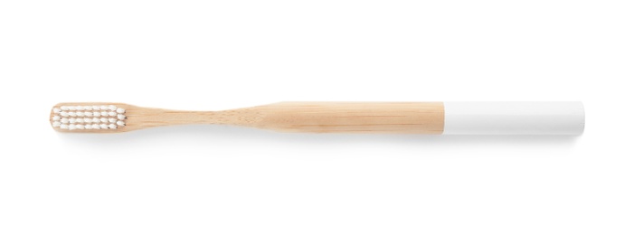 Toothbrush made of bamboo on white background, top view