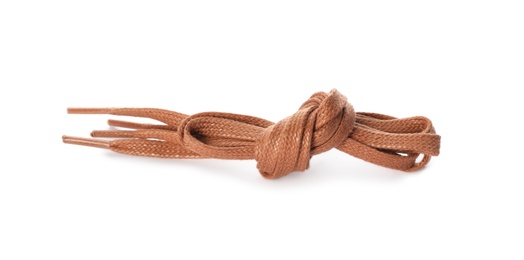 Photo of Brown shoe laces tied in knot isolated on white