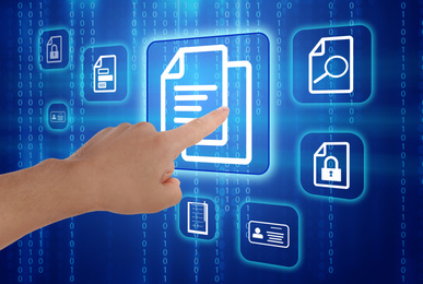 Image of Man pointing at document icon on virtual screen, closeup