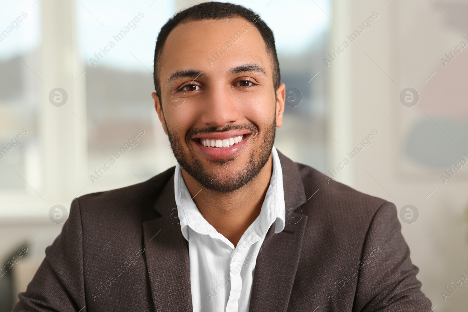 Photo of Young man having online video call at home, view from camera