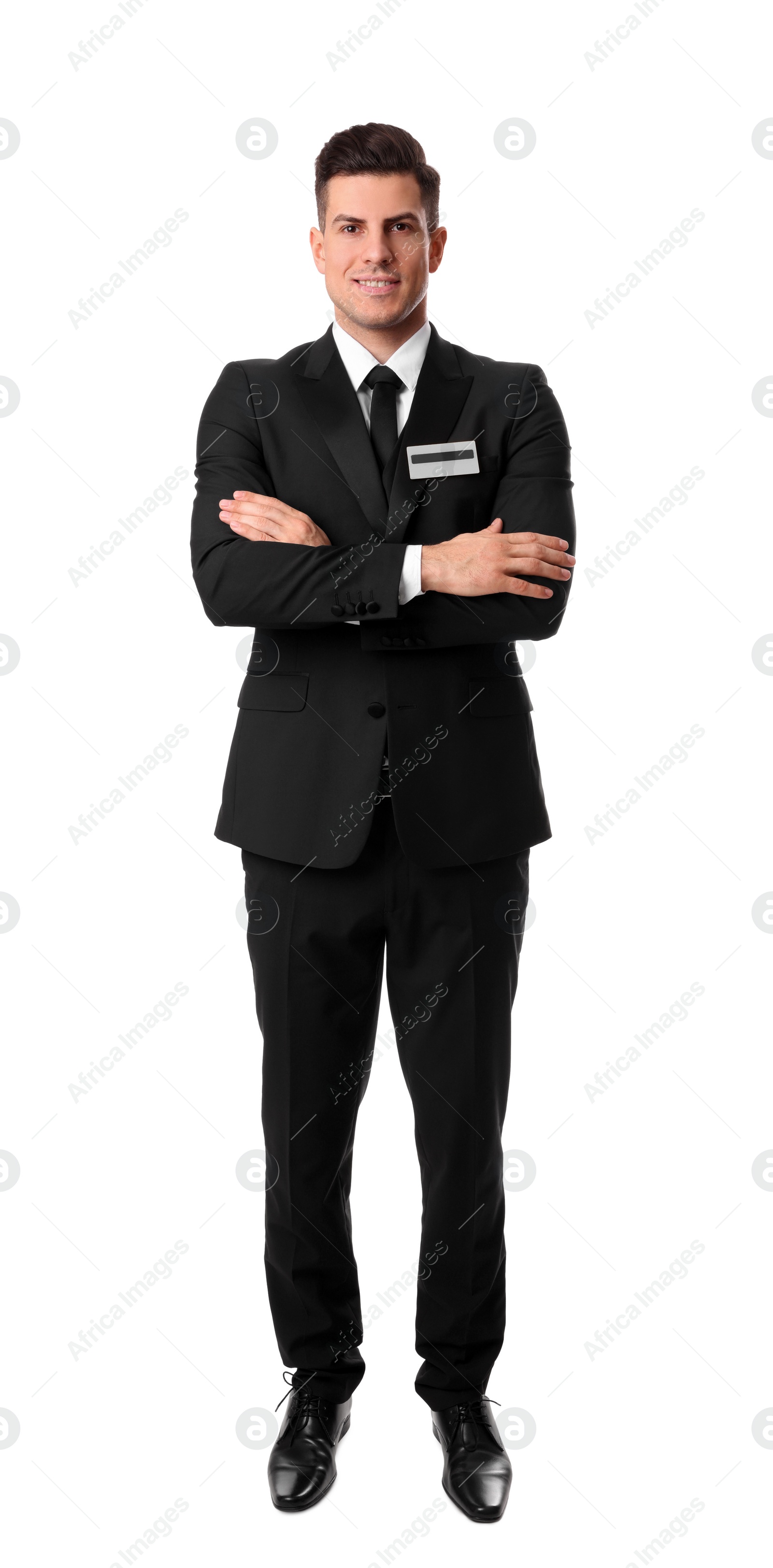 Photo of Full length portrait of happy receptionist in uniform on white background