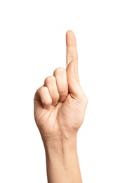 Photo of Woman showing number one on white background, closeup. Sign language