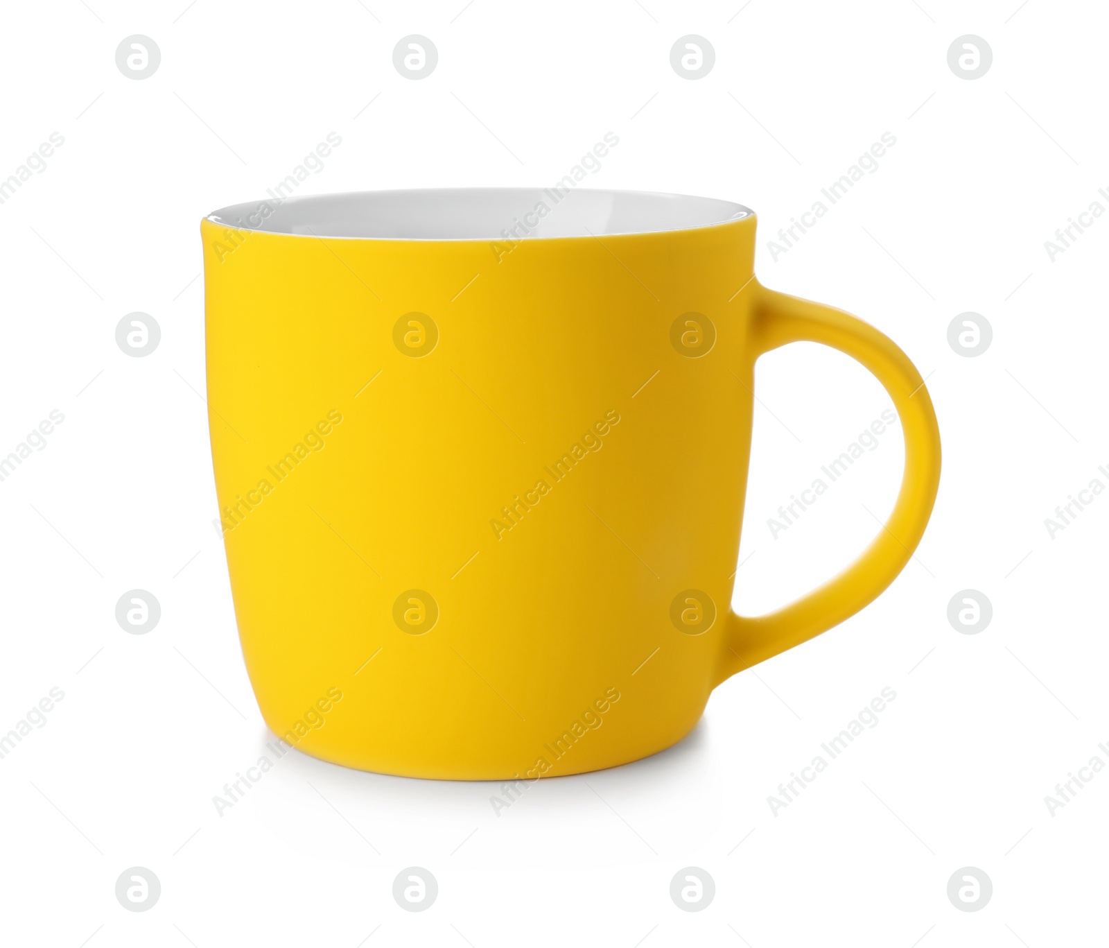 Photo of Yellow ceramic cup isolated on white