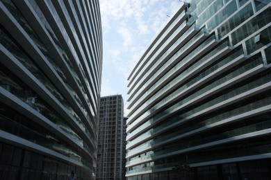 Photo of BATUMI, GEORGIA - JUNE 10, 2022: View of modern buildings on sunny day
