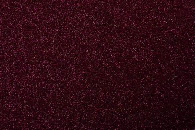 Beautiful shiny burgundy glitter as background, closeup