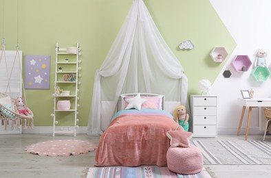 Cute child's room interior with toys and modern furniture