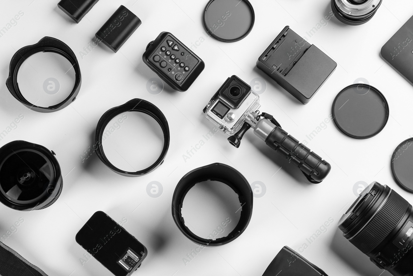 Photo of Composition with photographer's equipment and accessories on white background, top view