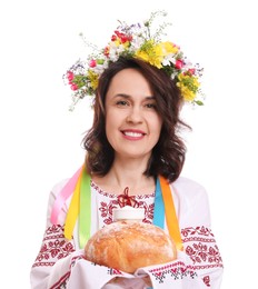 Photo of Happy woman in national ukrainian clothes with traditional korovai on white background
