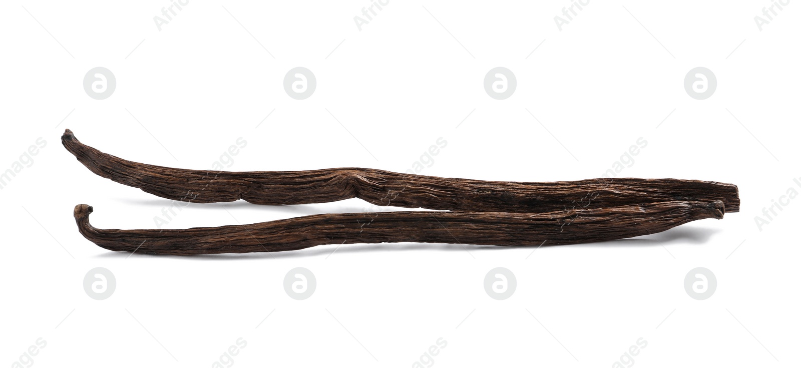 Photo of Dried aromatic vanilla sticks on white background