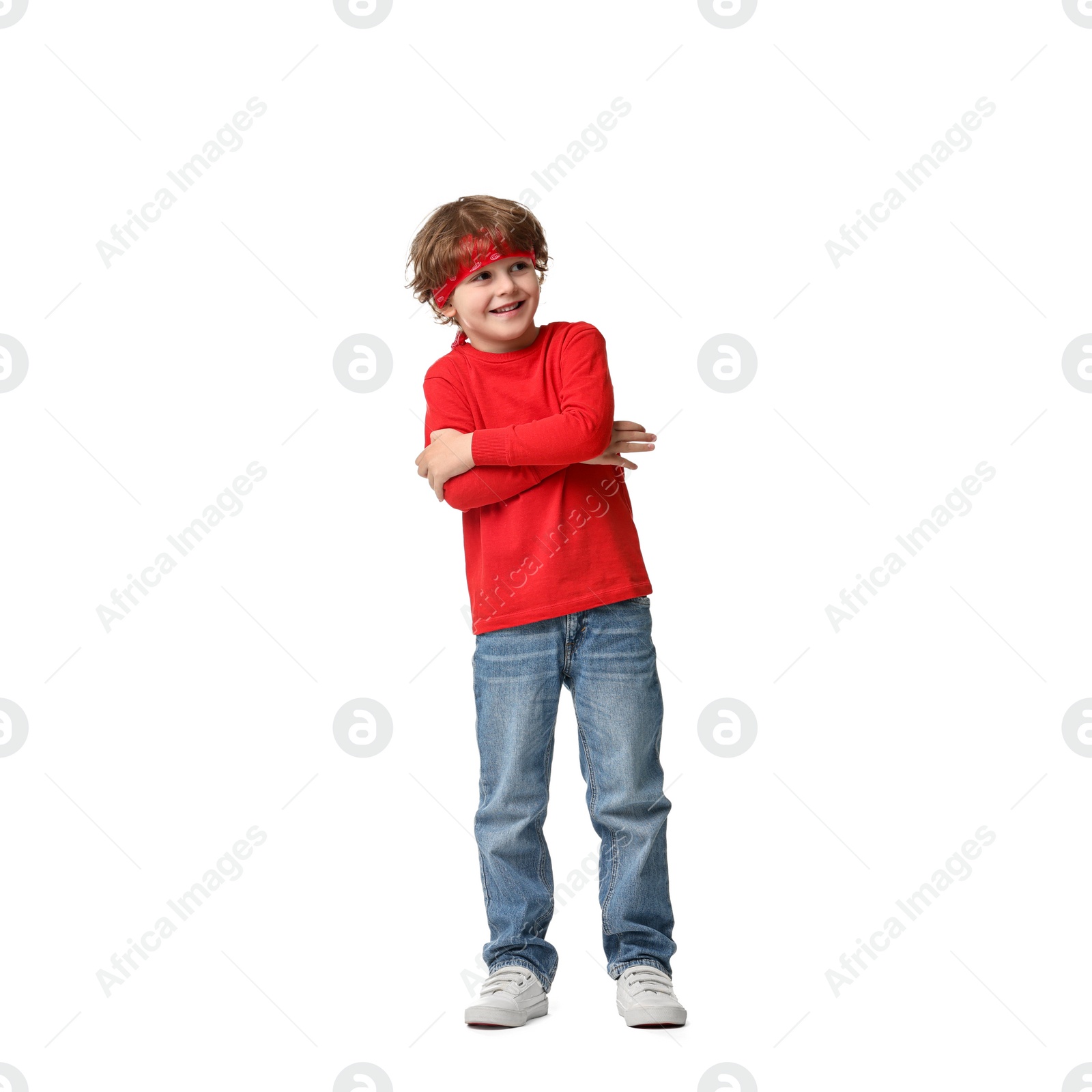 Photo of Happy little boy dancing on white background