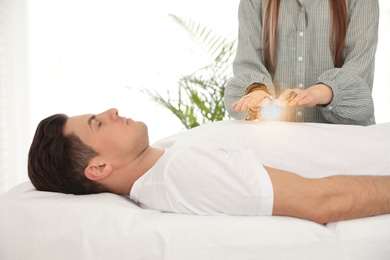 Man during healing session in therapy room