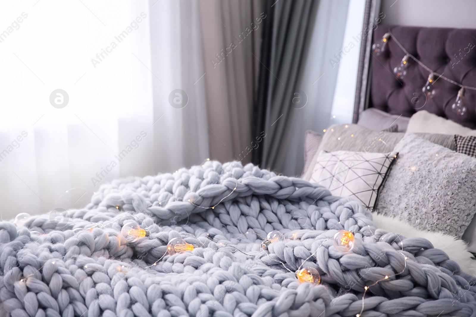 Photo of Cozy room interior with comfortable bed