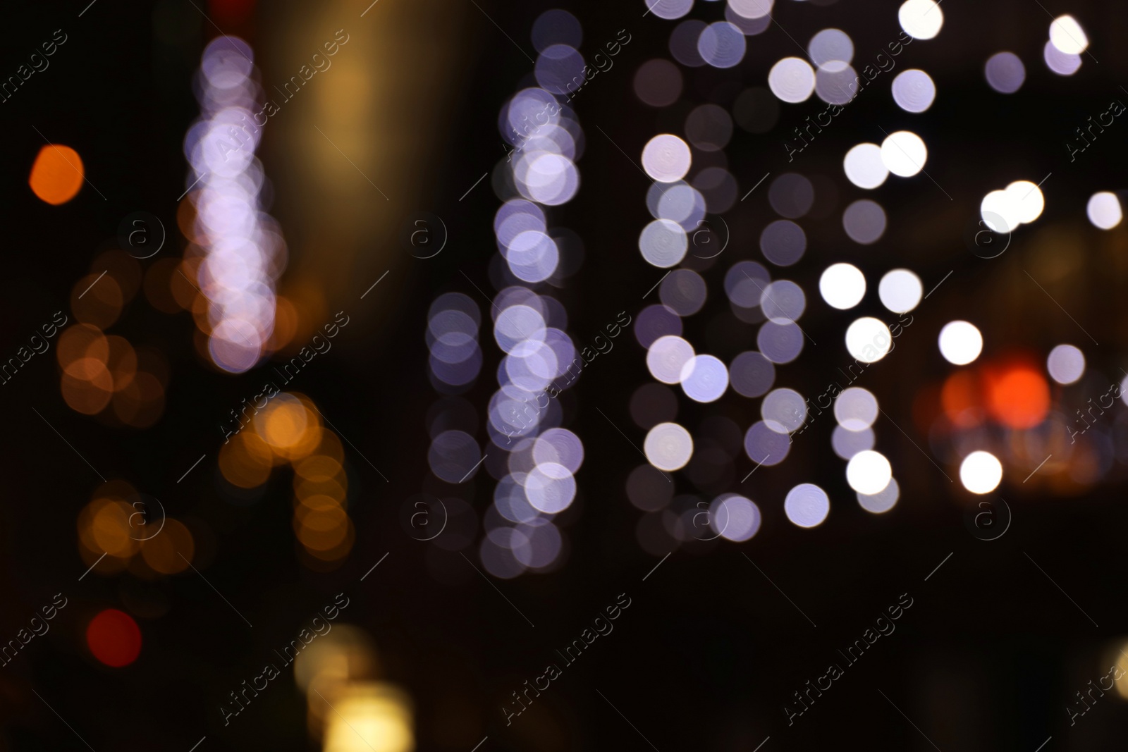 Photo of Beautiful street lights at night. Bokeh effect