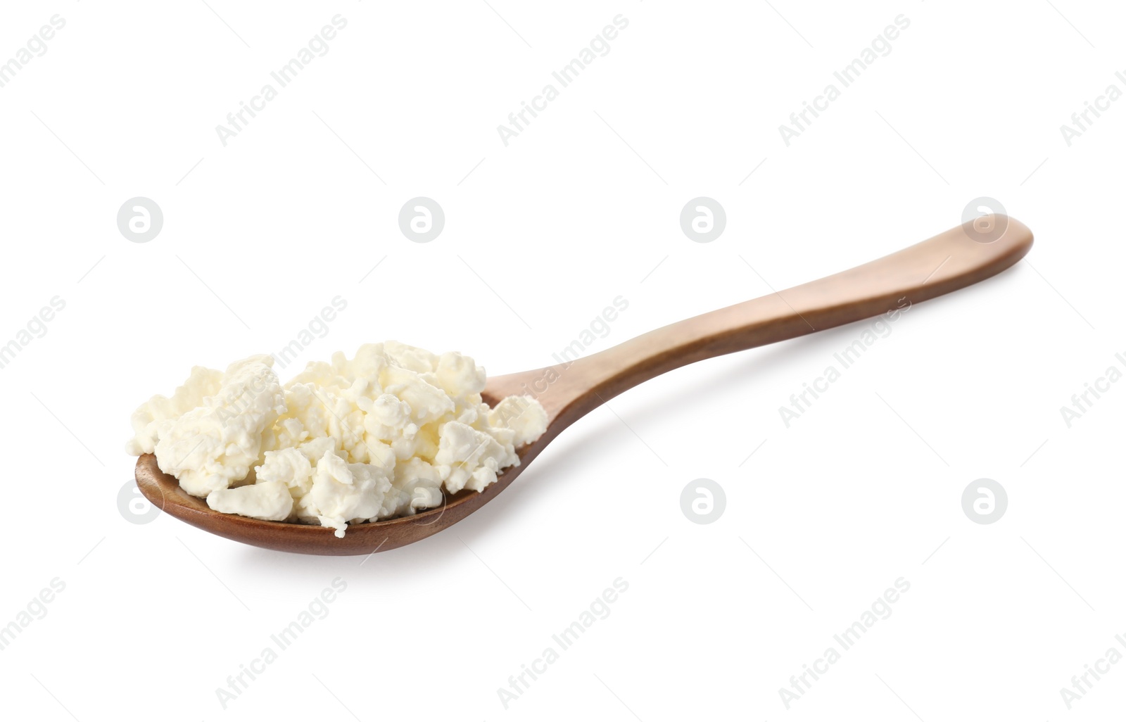 Photo of Delicious fresh cottage cheese in spoon isolated on white