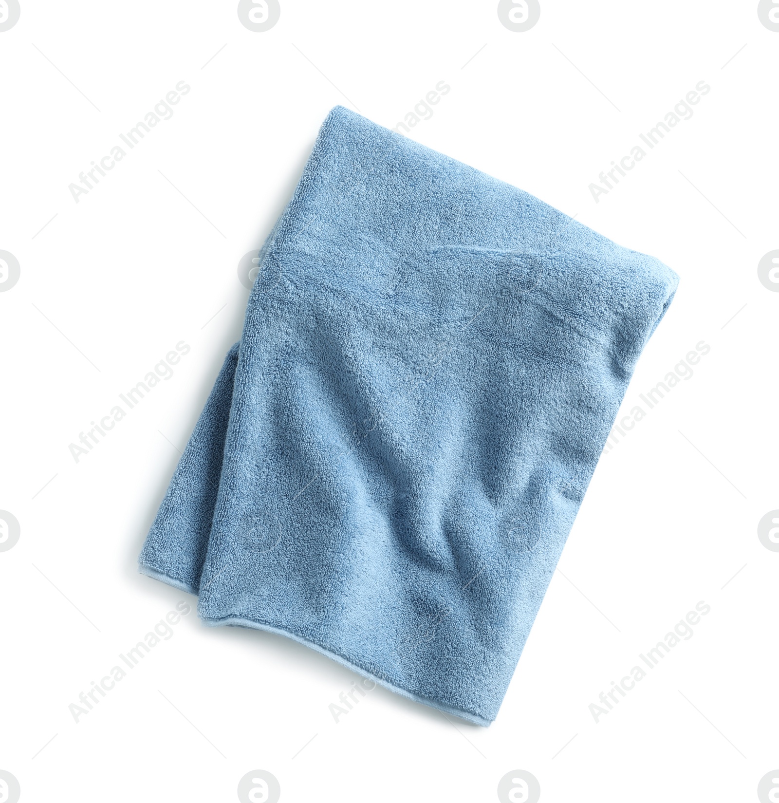 Photo of Soft folded towel isolated on white, top view