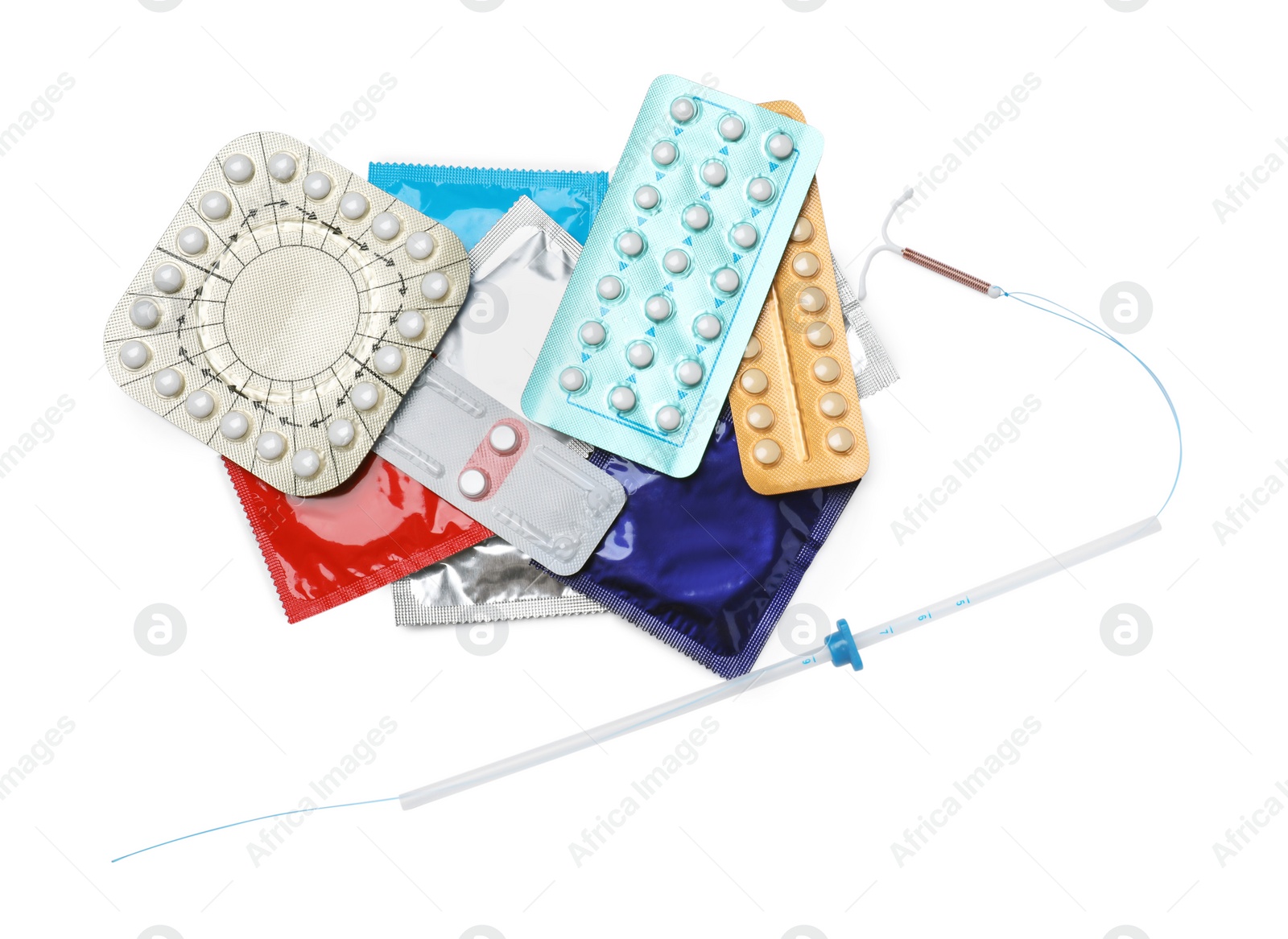 Photo of Contraceptive pills, condoms and intrauterine device isolated on white, top view. Different birth control methods