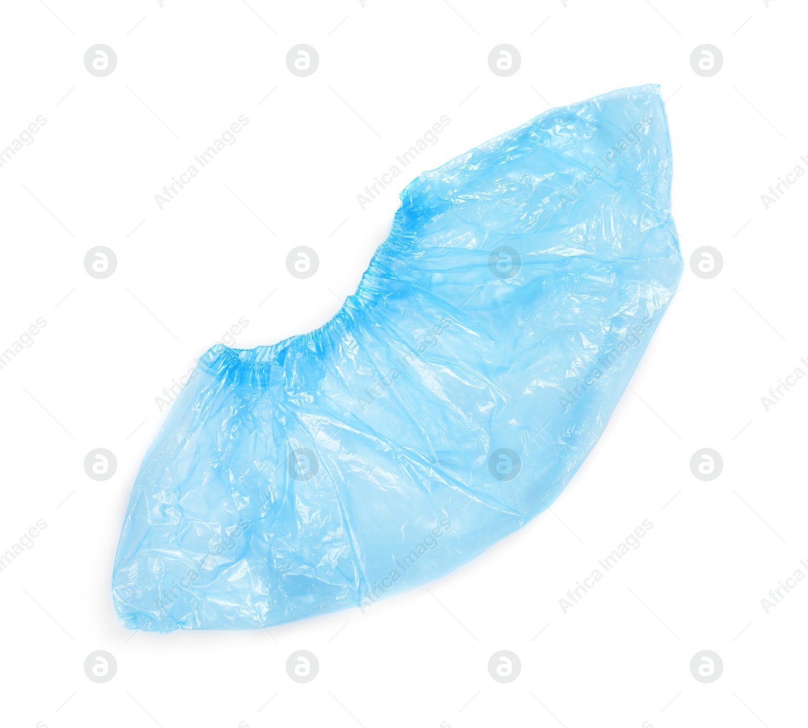 Photo of Medical blue shoe cover on white background