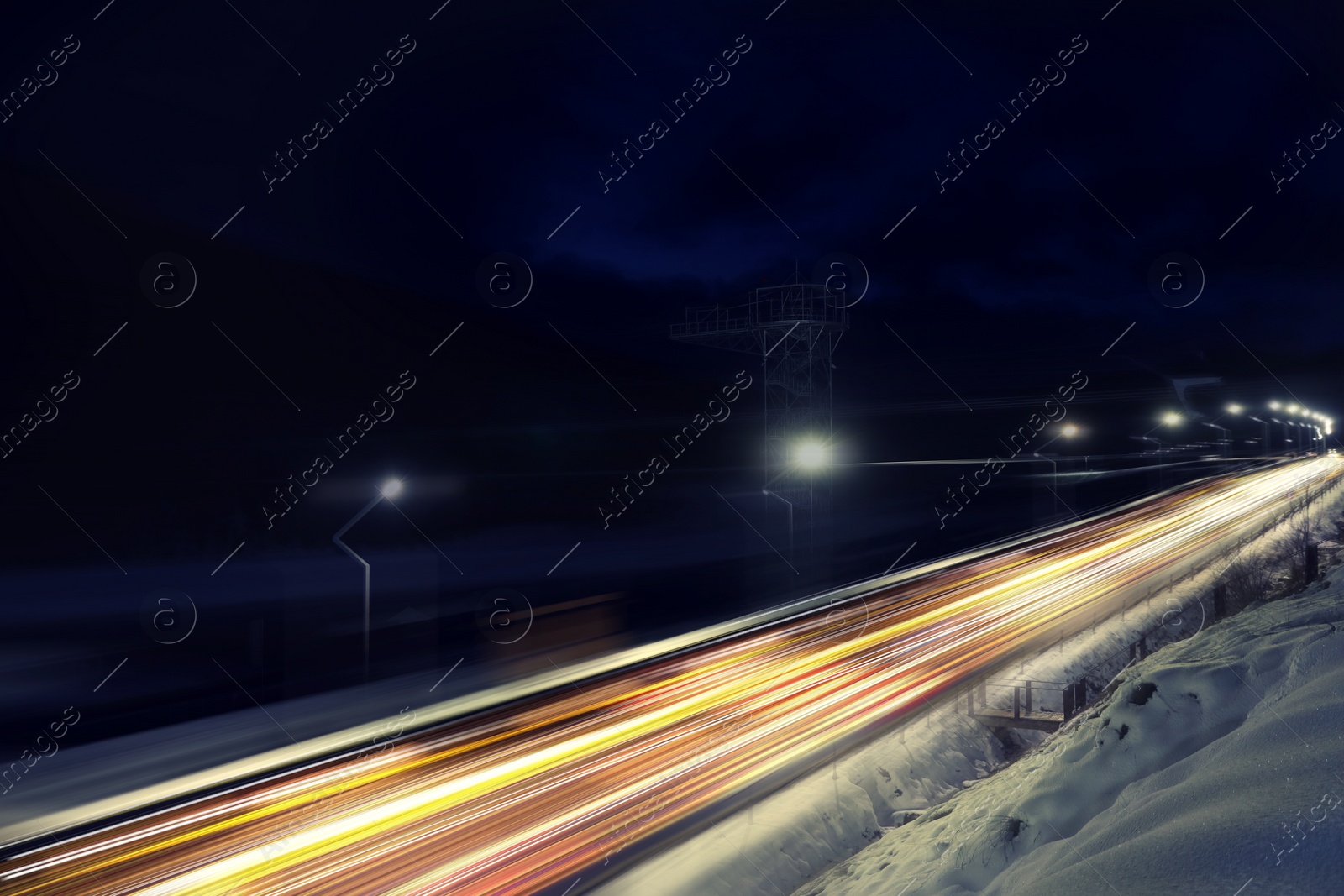 Image of Road traffic, motion blur effect. View of car light trails at night