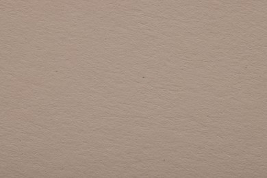 Texture of light grey paper sheet as background, top view