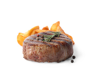 Photo of Delicious grilled beef medallion with fried potatoes isolated on white