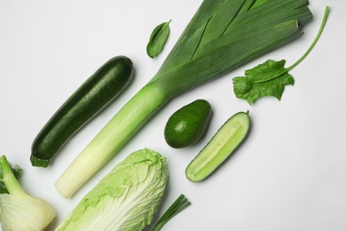 Photo of Flat lay composition with fresh ripe vegetables on white background