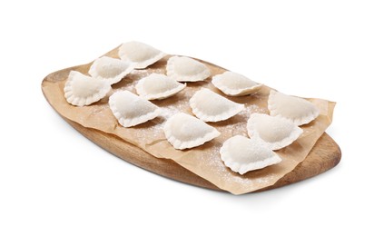 Photo of Raw dumplings (varenyky) with tasty filling and flour on white background