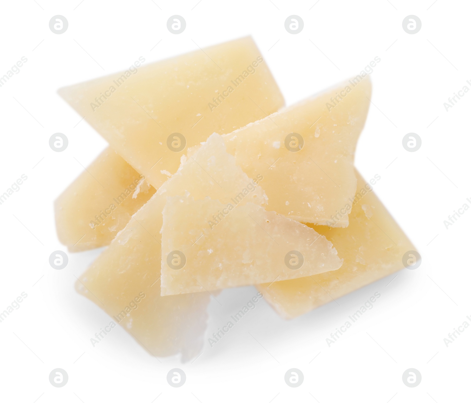 Photo of Pile of parmesan cheese pieces on white background