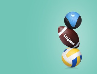 Image of Stack of sport and medicine balls on aquamarine background, space for text
