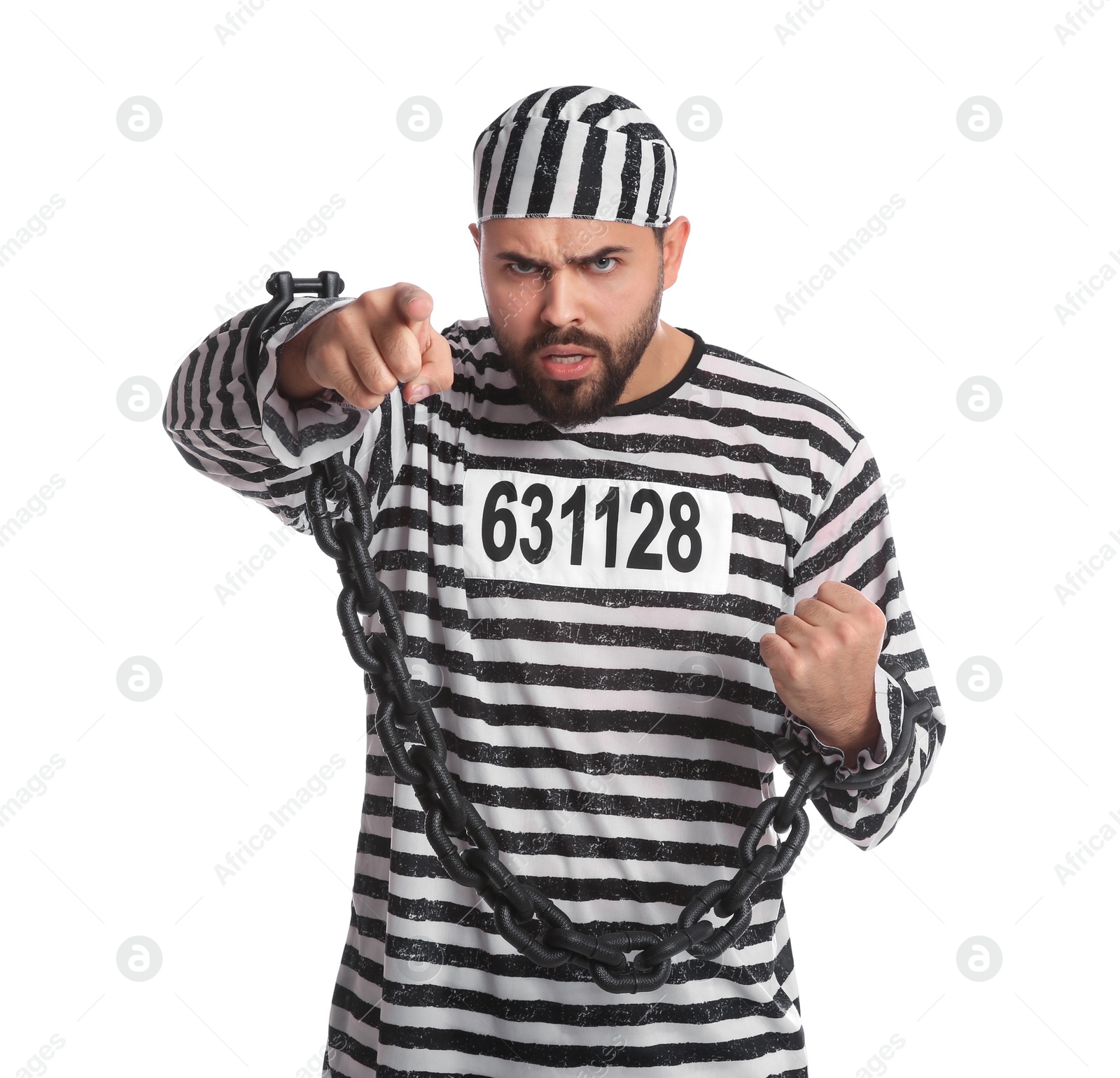 Photo of Angry prisoner in special uniform with chained hands on white background