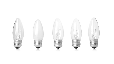 Photo of Frosted and transparent lamp bulbs on white background